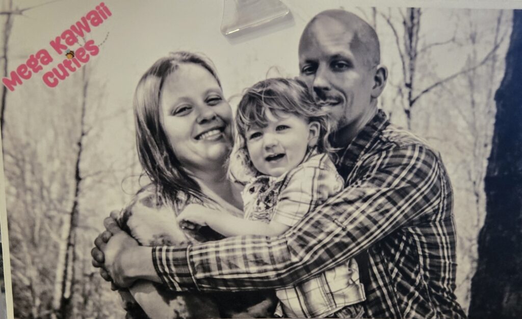 Adam and Amanda with their son